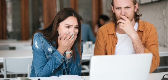 A guy found out his gay pal is on an anti-LGBT far-right website. (Stock photo via Envato Elements)