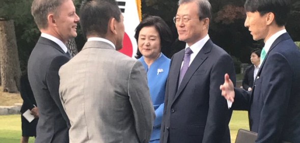 President Moon Jae-in of South Korea and his wife Kim Jung-sook, meet New Zealand ambassador Philip Turner and his husband Hiroshi Ikeda