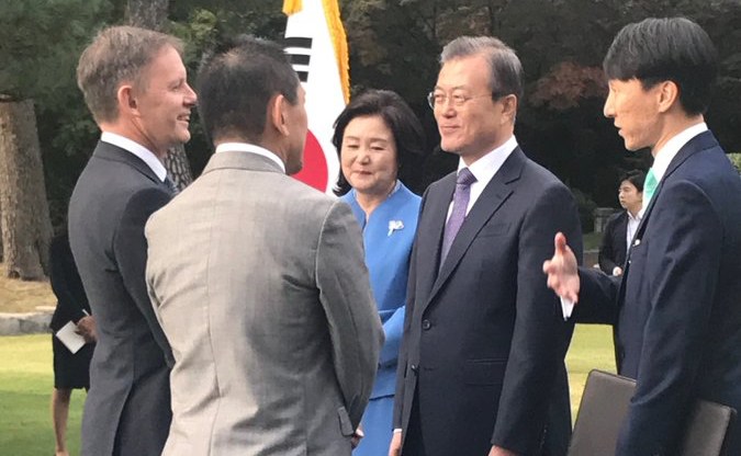 President Moon Jae-in of South Korea and his wife Kim Jung-sook, meet New Zealand ambassador Philip Turner and his husband Hiroshi Ikeda