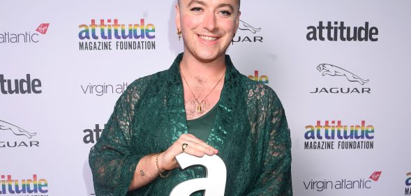 Sam Smith poses with the Attitude Person of the Year Award at the Attitude Awards 2019 at The Roundhouse. (Dave J Hogan/Getty Images)