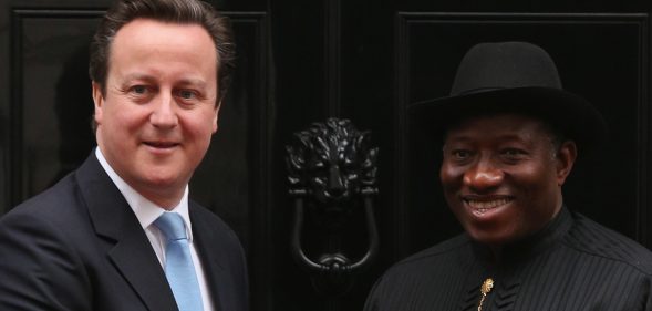 Former Nigerian president Goodluck Jonathan (R) is welcomed to Downing Street by then British prime minister David Cameron in 2013. (Oli Scarff/Getty Images)