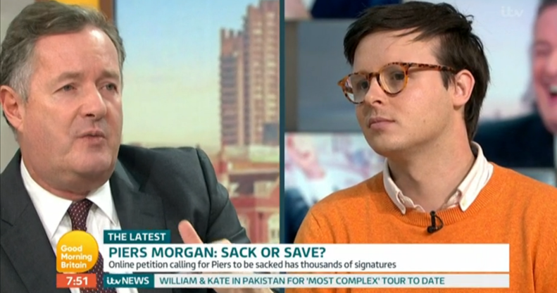 Piers Morgan (L) debated with gay journalist Benjamin Butterworth on whether the Good Morning Britain should should be sacked for his anti-trans comments. (Screen capture via ITV)