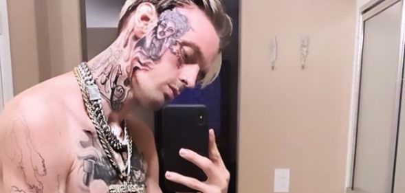 Aaron Carter reveals massive new face tattoo while declaring he's 'the biggest thing in music'. Yes, really