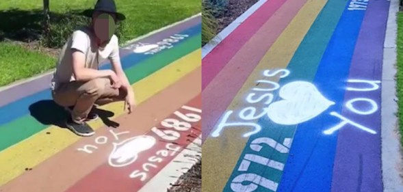A rainbow walk with 'Jesus loves you' spray painted all over it