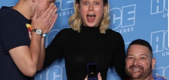 A gay couple got engaged right in front of Brie Larson and her reaction should be framed and hung in the Louvre