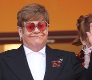 Elton John waving