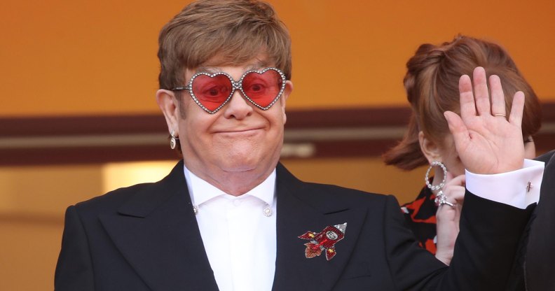 Elton John waving