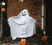A queer person dressed up as the spirit that has possessed them. Spooky. (Stock photo via Elements Envato)