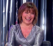 Lorraine Kelly smiling on Drag Race UK's Snatch Game