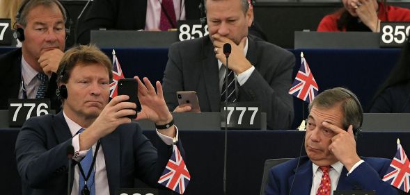 Members of Brexit Party, Rupert Lowe (776), Nathan Gill (777), Richard Tice (689) and Nigel Farage attend a debate on Brexit at the European Parliament. (FREDERICK FLORIN/AFP via Getty Images)