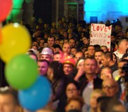 People gather to celebrate in Saint George's Square after the Maltese parliament approved a civil unions bill in Valletta on April 14, 2014. (Matthew Mirabelli/AFP via Getty Images)