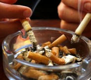 A couple smoke cigarettes. File photo.