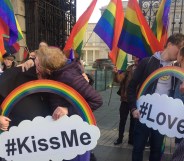 Queer couples kiss outside Irish parliament to demand better hate crime legislation