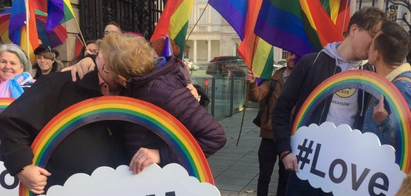 Queer couples kiss outside Irish parliament to demand better hate crime legislation