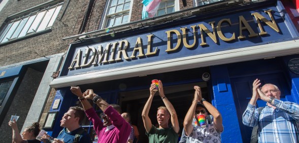 Customers at the Admiral Duncan applaud the 2019 Trans Pride parade.