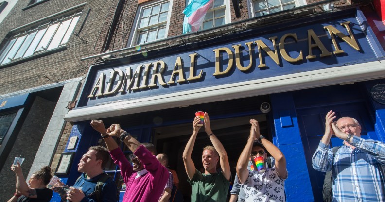Customers at the Admiral Duncan applaud the 2019 Trans Pride parade.