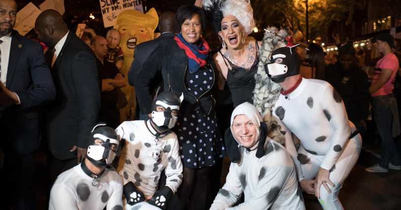 The mayor of Washington DC posing with a drag queen and her pups for Halloween is a huge, huge mood