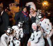 The mayor of Washington DC posing with a drag queen and her pups for Halloween is a huge, huge mood