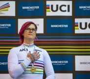 Canadian cyclist Rachel McKinnon celebrates her gold medal on the podium for the F35-39 Sprint discipline of the UCI Masters Track Cycling World Championships