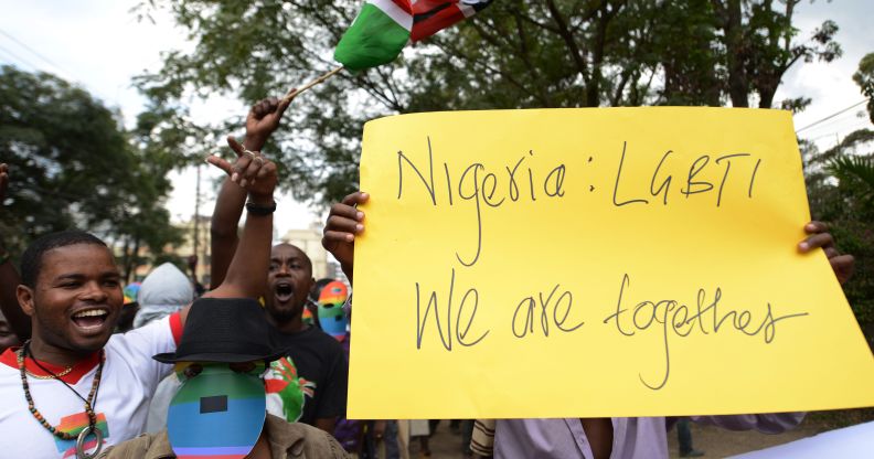 Kenyan gay and lesbian organisations demonstrate outside the Nigerian High Commission in Nairobi, one holding a yellow sign that reads: 'Nigeria: LGBTI, We are together'