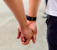 Two men walking hand in hand at the 2019 LGBT Pride Parade in Taipei. (Alberto Buzzola/LightRocket via Getty Images)