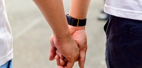 Two men walking hand in hand at the 2019 LGBT Pride Parade in Taipei. (Alberto Buzzola/LightRocket via Getty Images)