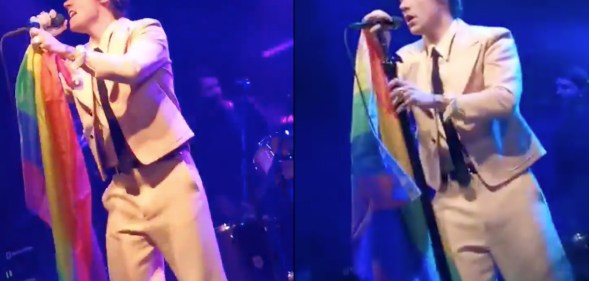 Our lord and saviour Harry Styles holding an LGBT+ Pride flag. We need this injected into our veins right now. (Screen captures via Twitter)