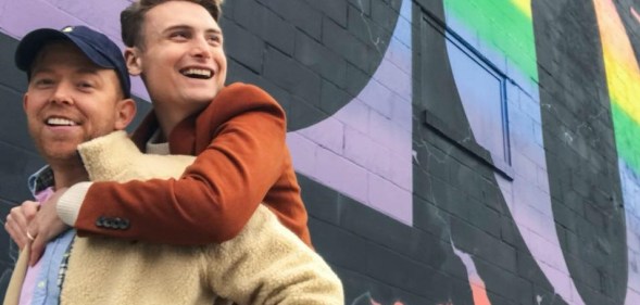 Christopher McKinney (left) with his husband Nicholas Clark