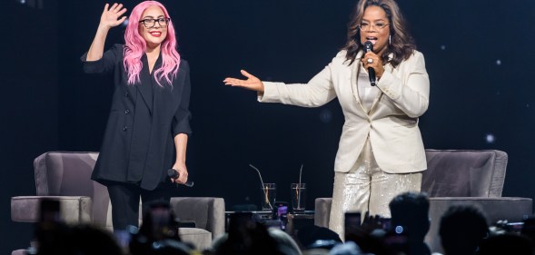 Lady Gaga and Oprah Winfrey speak during the WW (Weight Watchers Reimagined) Oprah's 2020 Vision: Your Life In Focus Tour. (Jason Koerner/Getty Images for Oprah)
