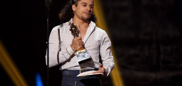 Adult film actor Armond Rizzo accepts the Social Media Star award during the 2020 GayVN Awards. (Gabe Ginsberg/Getty Images)