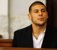 Aaron Hernandez sits in the courtroom of the Attleboro District Court during his hearing on August 22, 2013 in North Attleboro, Massachusetts. (Jared Wickerham/Getty Images)