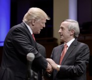 US president Donald Trump is greeting by pastor Robert Jeffress