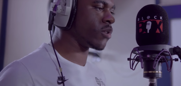 Gay rapper Mr Strange opened up about the homophobia he receives in a new song. (Screenshot via YouTube)