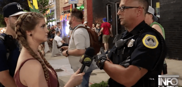 Katilin Bennett's discussion with a police officer at an Iowa, US, Pride has gone viral. (Screen capture via YouTube)