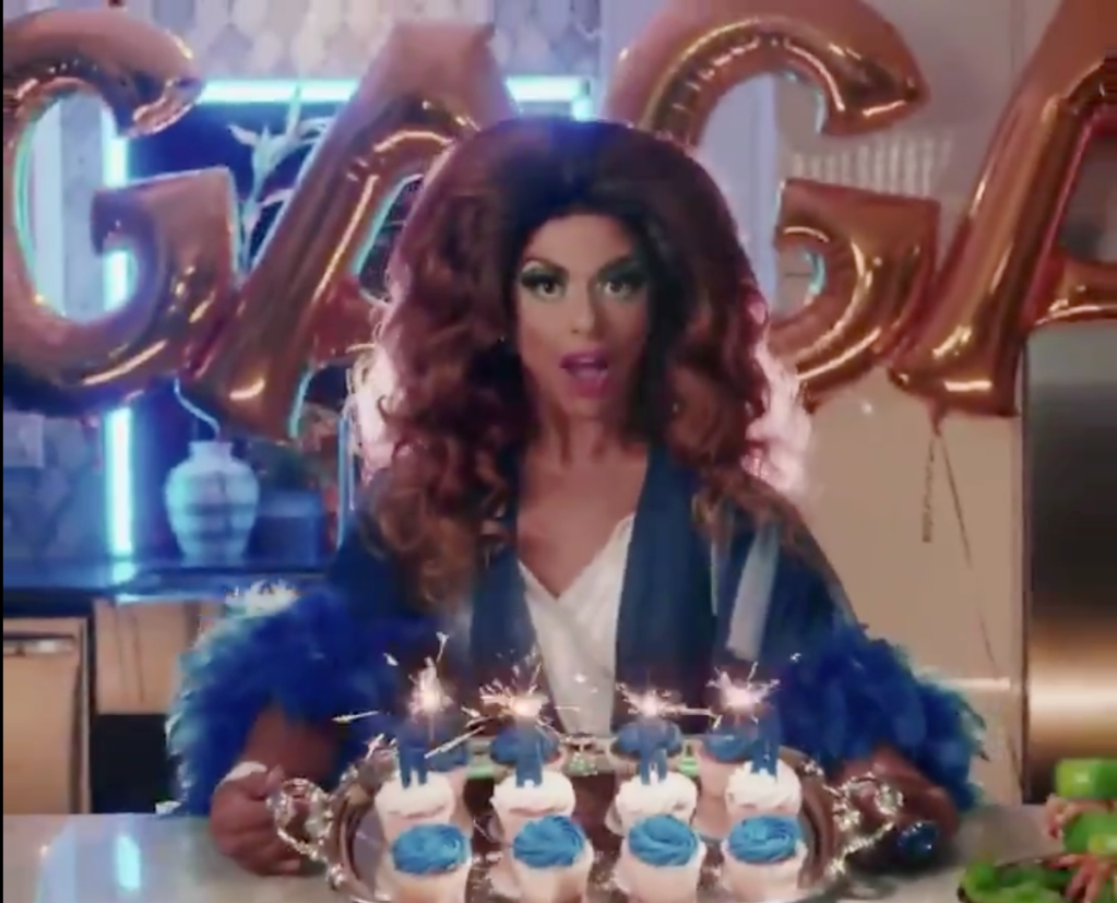 Shangela served Lady Gaga cupcakes in the first trailer for the pair's Super Saturday Night performance. (Screen capture via Twitter)
