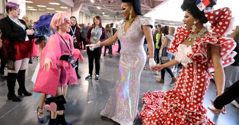 Alexis Mateo and Serena ChaCha meet a young fan also dressed in drag.