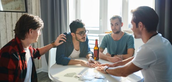 A man is sleeping with two of six brothers that he's also living with. Not awkward in the slightest, we imagine. (Stock photo via Envato Elements)