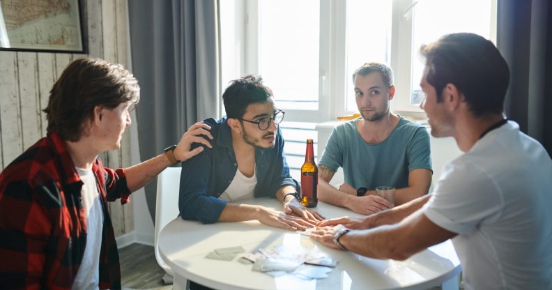 A man is sleeping with two of six brothers that he's also living with. Not awkward in the slightest, we imagine. (Stock photo via Envato Elements)
