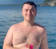 Sam Smith topless on a boat