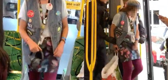 An unidentified woman claimed the 'gay community run the police force' before hurling homophobic slurs and being escorted by Australian Federal Police officers. (Screen captures via YouTube)