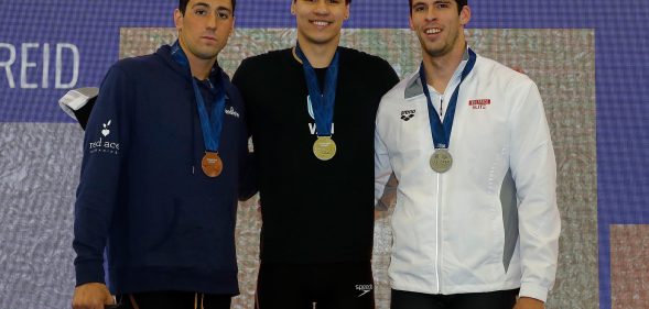 Markus Thormeyer (C) of Canada poses with his gold medal. (Kevin C. Cox/Getty Images)