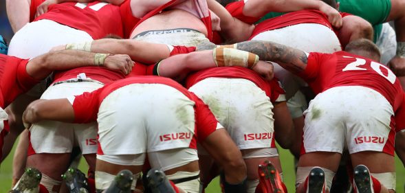 A photo showing Wales' rugby team in a scrum position during an Ireland v Wales Six Nations game