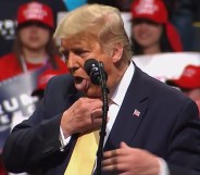 Donald Trump choking himself