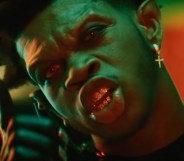Lil Nas X with sharp vampire teeth