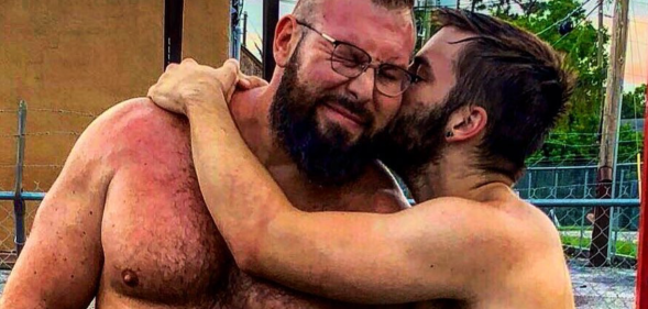 Mike Parrow (L) snuggles his husband Morgan Cole. (Instagram)