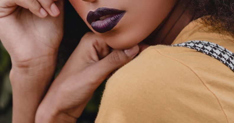 non-binary person fired for wearing lipstick