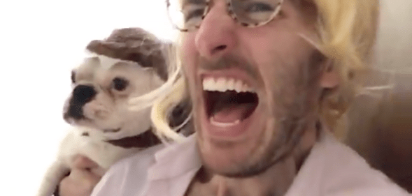 Amid the coronavirus lockdown measures, a gay couple re-created the 1993 Jurassic Park film trailer shot for shot, with their french bulldog, Yolk. (Screen capture via Twitter)