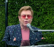 Elton John playing piano