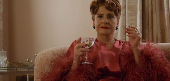 Patti LuPone holding a martini glass in Hollywood