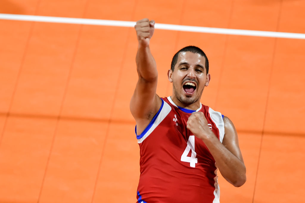 Dennis Del Valle of Puerto Rico celebrates after scoring a point against Colombia in the men's volleyball match for the gold medal during the 2018 Central American and Caribbean Games